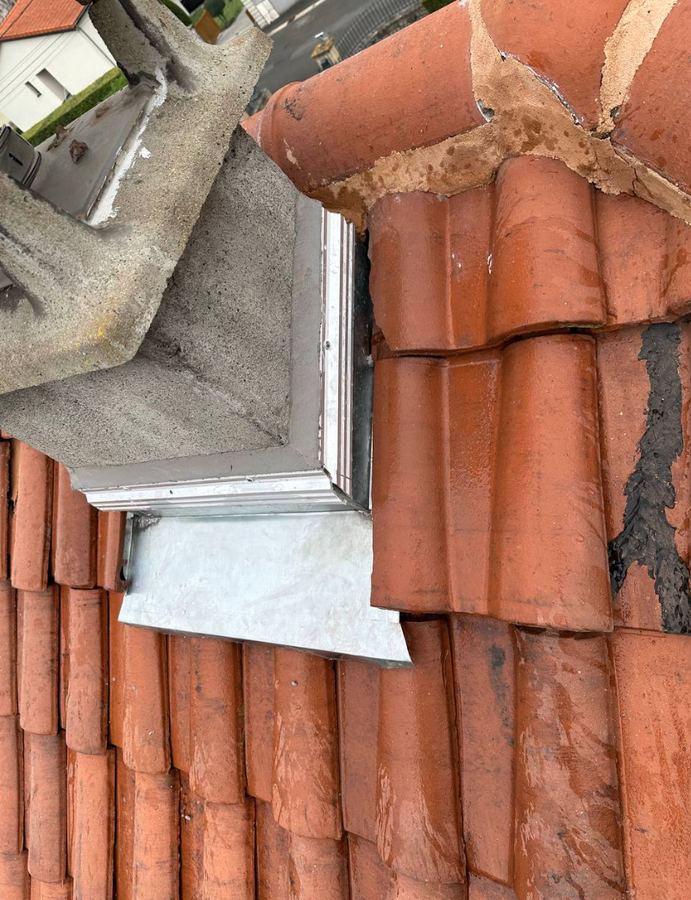Habillage zinc autour d'une cheminée
